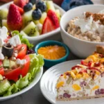 Whole-grain crackers topped with cottage cheese and garnished with fresh herbs