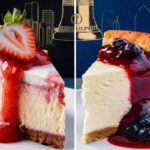 An overhead view of a perfectly baked cheesecake with a smooth, creamy surface and a golden-brown crust, showcasing the rich texture and inviting appearance of a classic New York-style cheesecake.